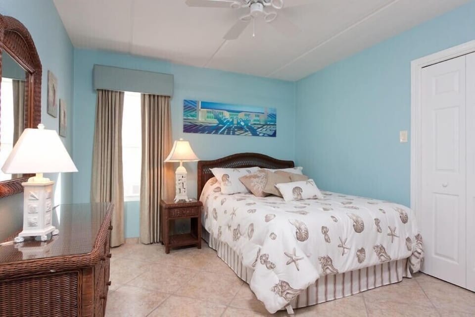 Guest bedroom has queen bed. 