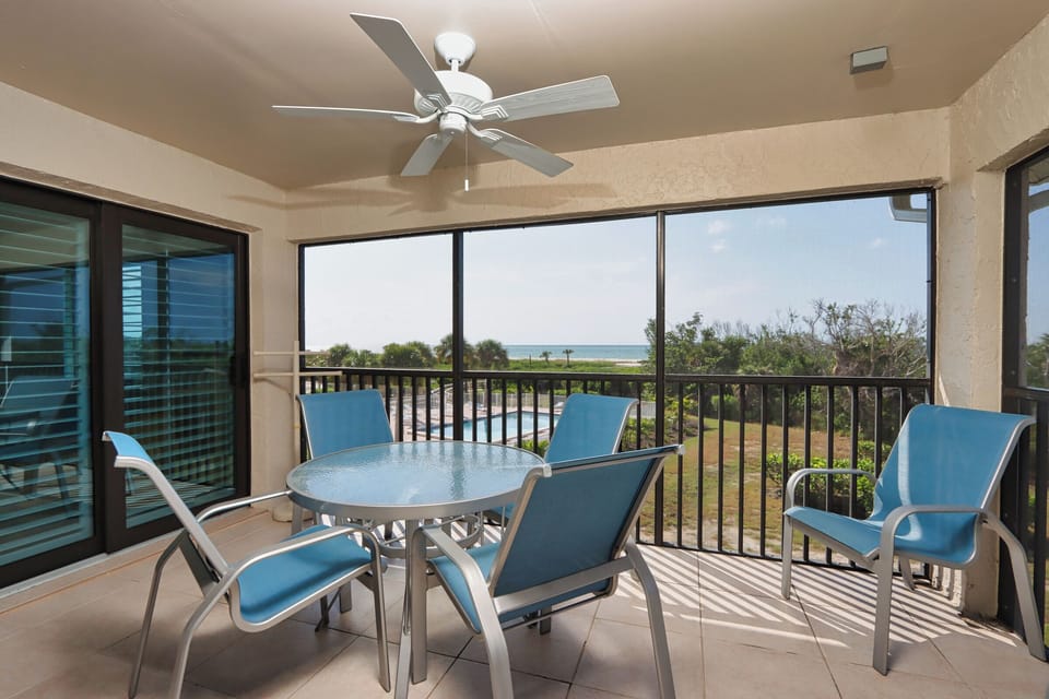 Screened lanai with dining table