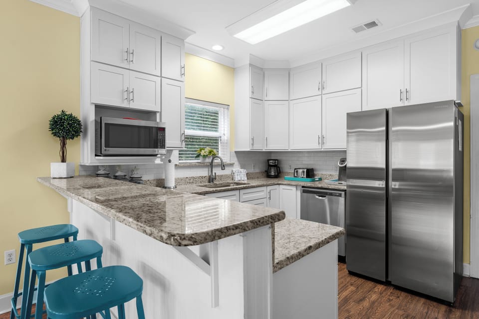 Inviting Fully Stocked Kitchen
