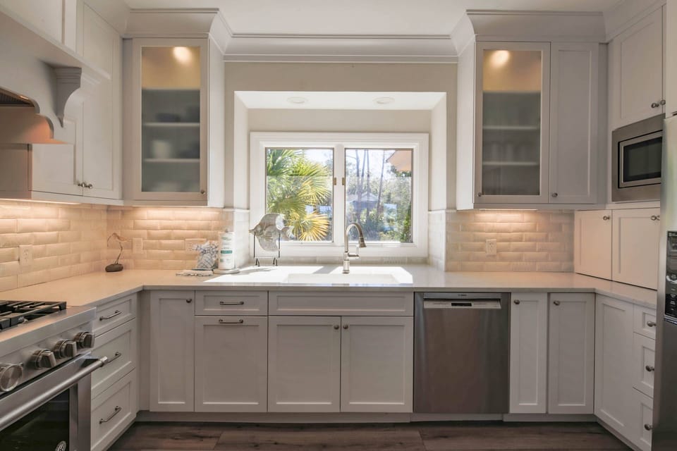 This picture window over the kitchen sink provides wonderful natural light.