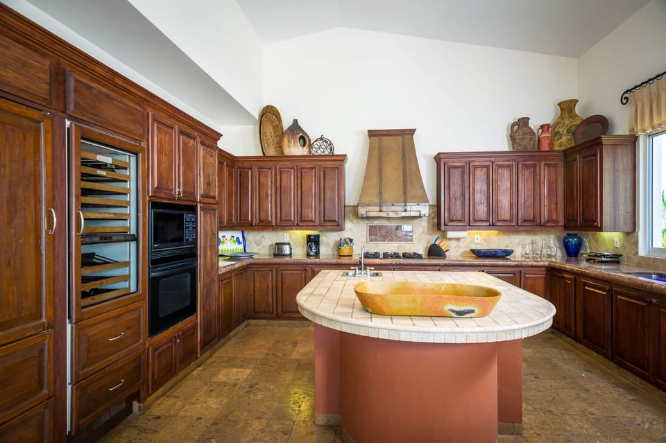 The large kitchen has plenty of counterspace for you to work on sharpening your culinary skills