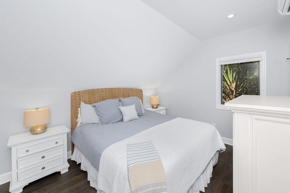 Bedroom in Guest House Above Garage