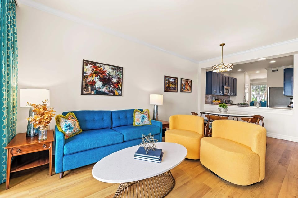 Living Room with Brand New Furniture and Flat Screen HDTV;