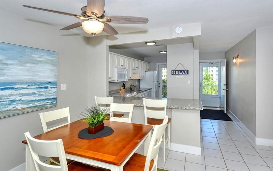 Dining to kitchen with two entrances