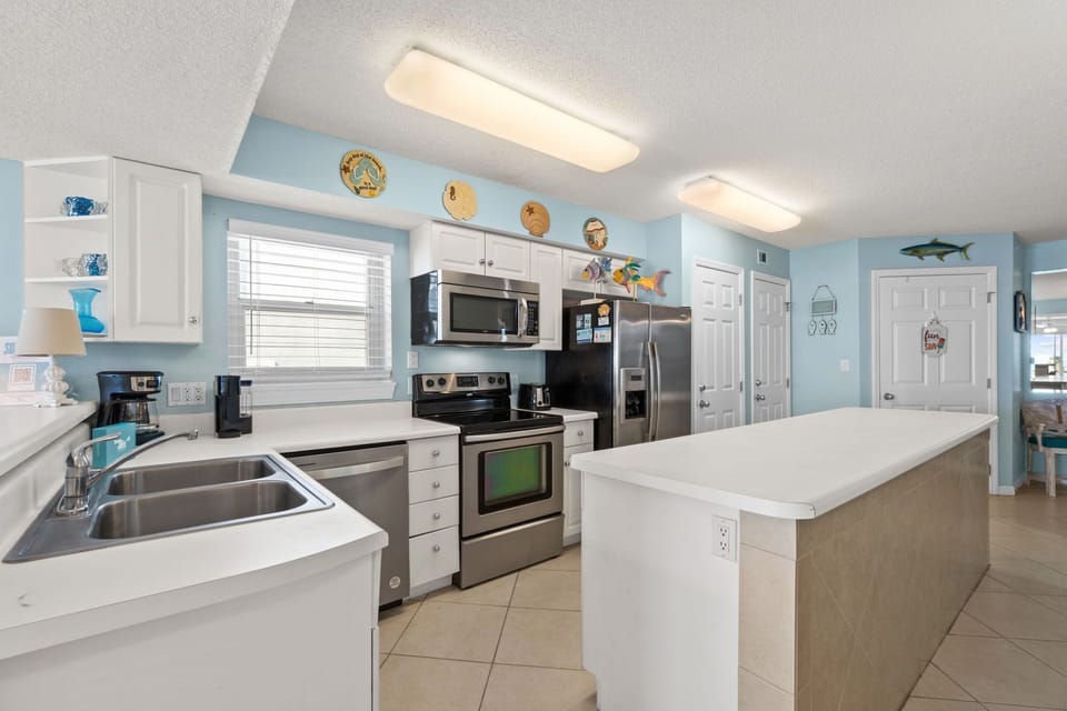 Kitchen - There is ample space to move around with ease and all major appliances are available for your use