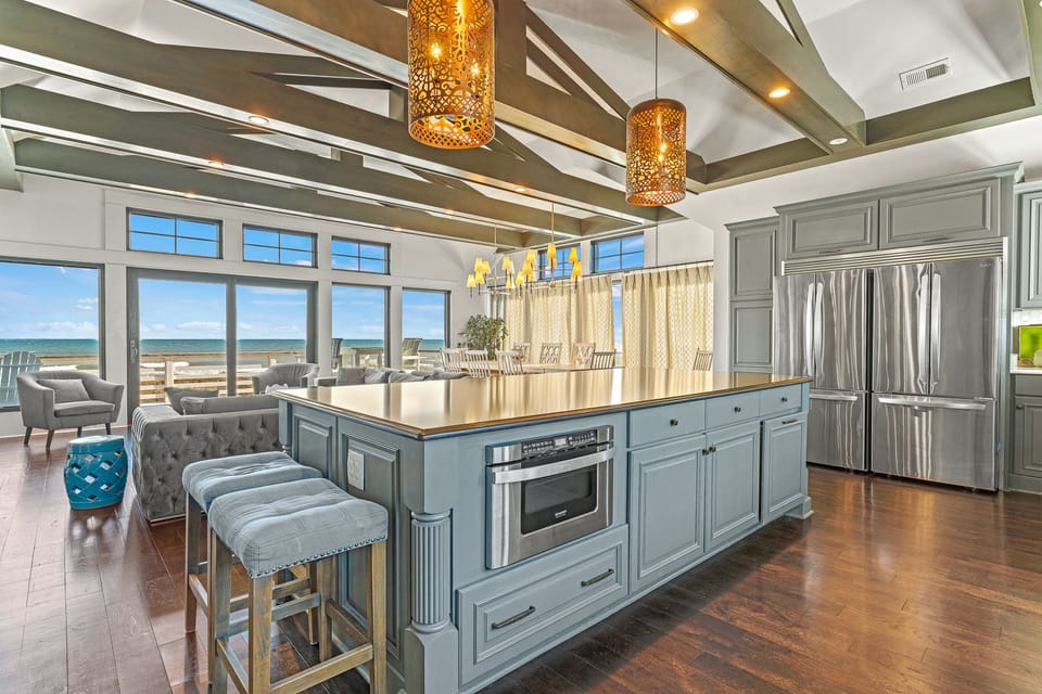 Luxurious Kitchen with Bar Seating on Third Level