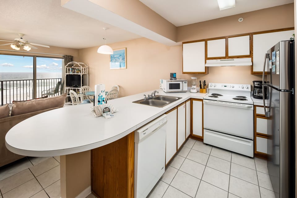 Kitchen - There is ample space to move around with ease in this elegant kitchen. All major appliances are available for your use.