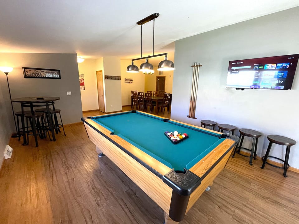 Game Area with Table & Chairs, TV & Pool Table