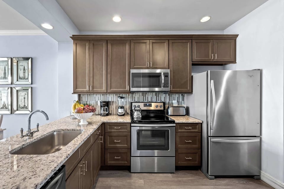 Fully Stocked Kitchen with Luxury Appliances; Granite Counter-tops and New Cabinetry! Totally Refurbished!