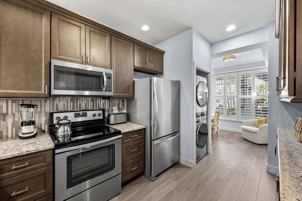 Fully Stocked Kitchen with Luxury Appliances; Granite Counter-tops and New Cabinetry! Totally Refurbished!