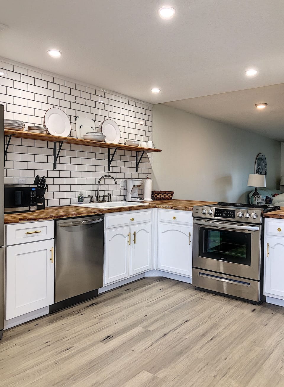 Kitchen - Newly renovated kitchen with butcher block counter tops and subway tile.  Brand new stainless steel appliance.