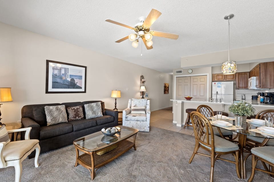 Living Room - Sleeper Sofa, two end tables with lamps, beautiful decor, and a recliner for extra seating or to just relax.