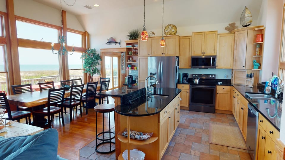 Updated appliances, granite counters.  WELL STOCKED kitchen.