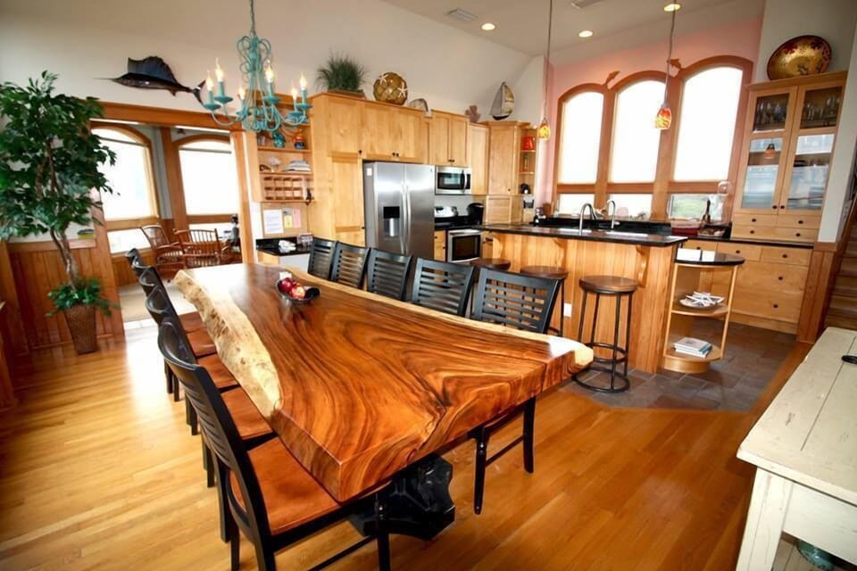 Kitchen, Dining and Sun Room - Beautiful Dining Table!  Sun room through doorway.