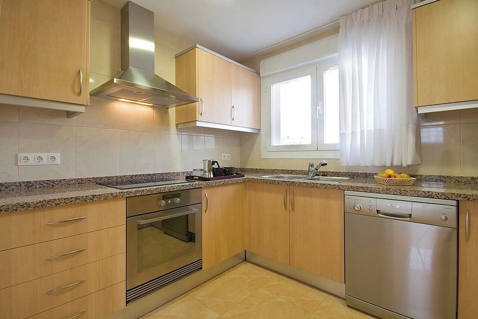 Pleasant summer villa with private pool in Calpe (Costa Blanca) for 12 people, with six bedrooms and four bathrooms, spread over two floors. It has air conditioning in the living room and in all bedrooms.INTERNAL: This villa consists of the GROUND FLOOR, which consists of a living-dining room with TV SAT/TDT, air conditioning, an American bar and access to the terrace and the pool. A fully equipped separate kitchen with dishwasher and ceramic hob. Two bedrooms each with a double bed. There is also a bathroom with a shower. The UPPER FLOOR consists of three bedrooms, each with two single beds, two of them with a bathroom with shower en suite. A double bedroom and finally a washroom.EXTERNAL: A large 10x5 pool fenced for child safety with roman steps and outside shower. There is also a built in barbecue and parking for 4 vehicles on the same property.LOCATION: Without a doubt, an unbeatable location, just 250 m from the nearest supermarket and restaurants. The sandy beach with all services is only 650 m away. There is also a cove 400 m away and Calpe town center 3 km away.REMARKS: Free wifi. Pets up to 12 kg are allowed at an additional cost.