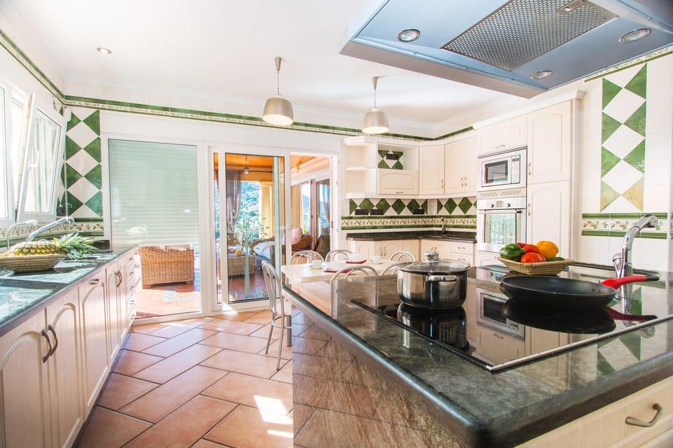Beautiful villa with private pool located in Calpe (Costa Blanca) for 10 people with five bedrooms and two bathrooms.INTERIOR: The villa is divided into three floors separated by internal stairs. The MAIN FLOOR is distributed in two bedrooms; one with two single beds and the other with a double bed. It has a bathroom with shower, which is accessed through the two bedrooms. From a double bedroom on this floor, a bedroom with a double bed is accessed by stairs. The GROUND FLOOR consists of a spacious living room and a fully equipped kitchen. Two rooms with two single beds each and a bathroom with separate shower.EXTERIOR: Exceptional rectangular pool, fenced for the safety of children. Splendid covered barbecue and a chill-out area where you can relax.DISTANCES: A short 750 m walk will take you to one of the best sandy coves in Calpe. Restaurant also in Cala Puerto Blanco. The center of Calpe and supermarket is 1.2 km away.OBSERVATIONS: Free Wifi. Pets with a weight of less than 12 kg can be accommodated with a supplement.