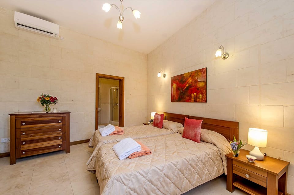 Bedroom of The Olives Gozo rental farmhouse