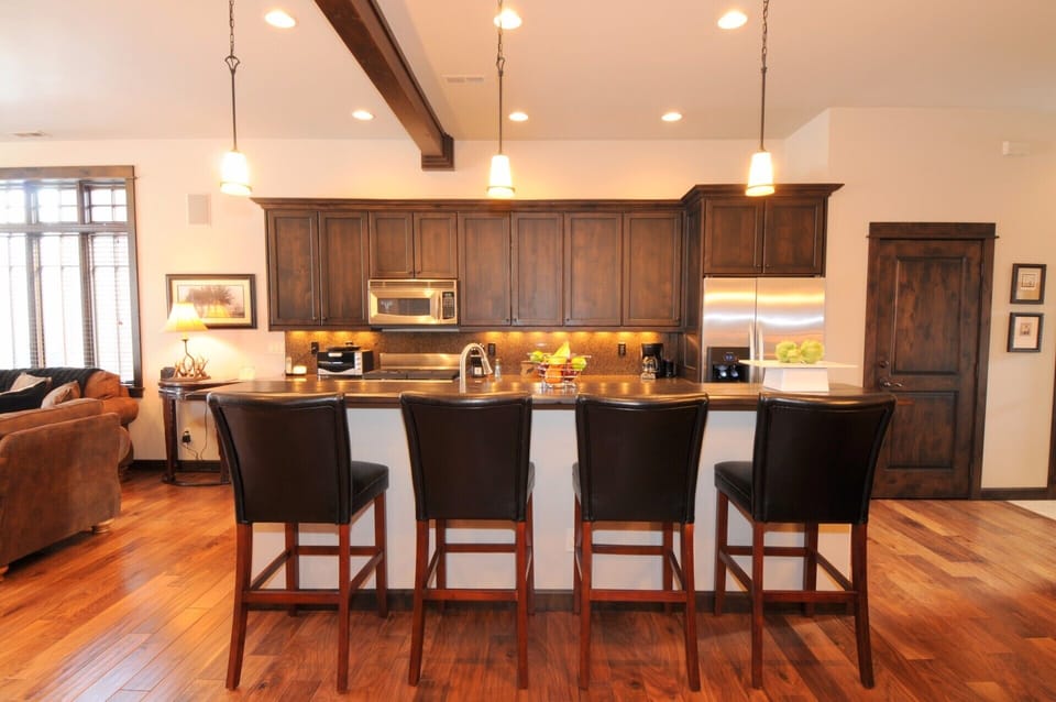 Bar seating for four to chat with the cook.