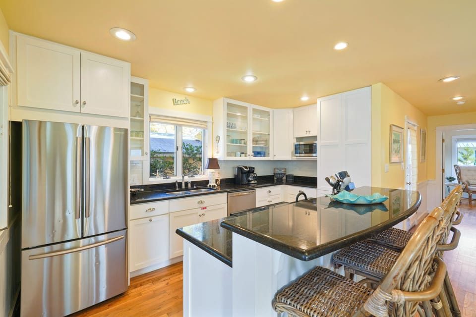 UPDATED KITCHEN WITH BAR SEATING FOR THREE