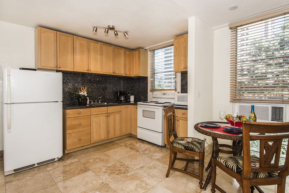 Dinning Table by the Kitchen and Window AC