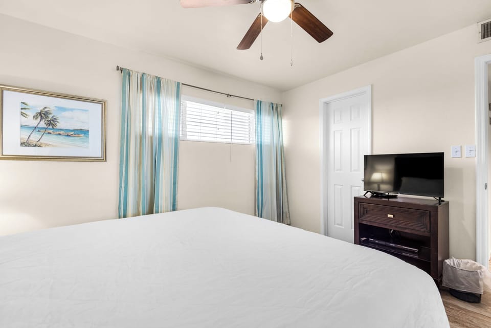 Guest bedroom with flat screen
