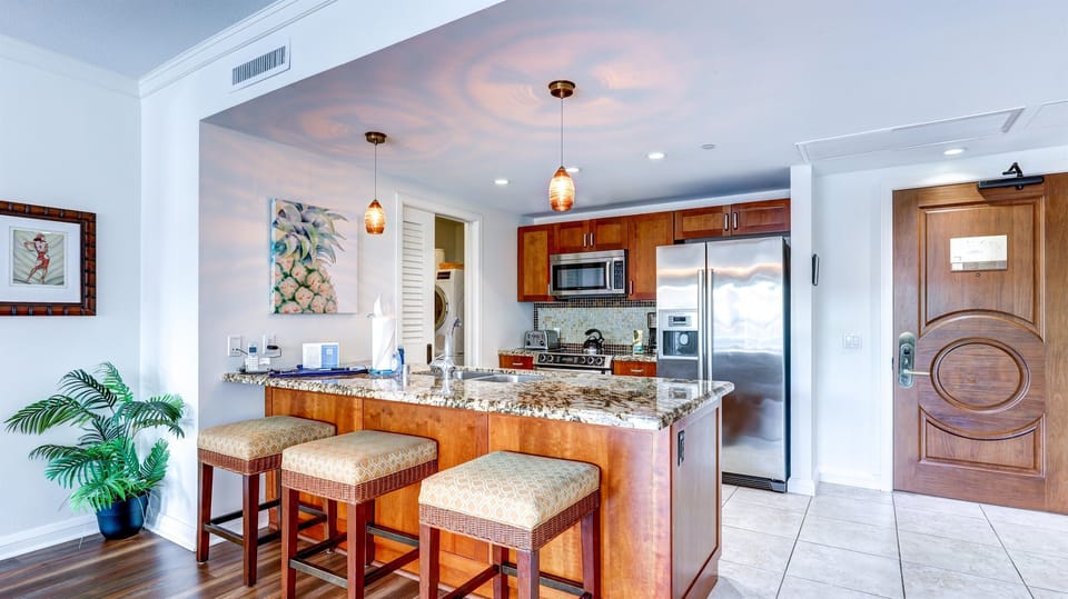 Beautiful granite kitchen island with bar seating 