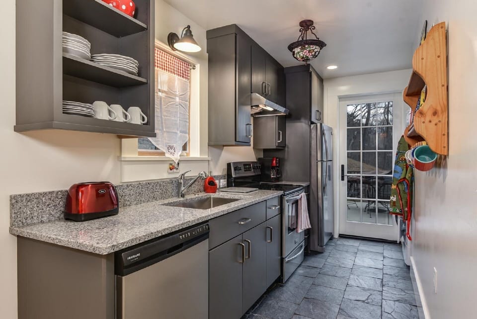 Full kitchen with full size appliances and W/D, private entrance from patio.