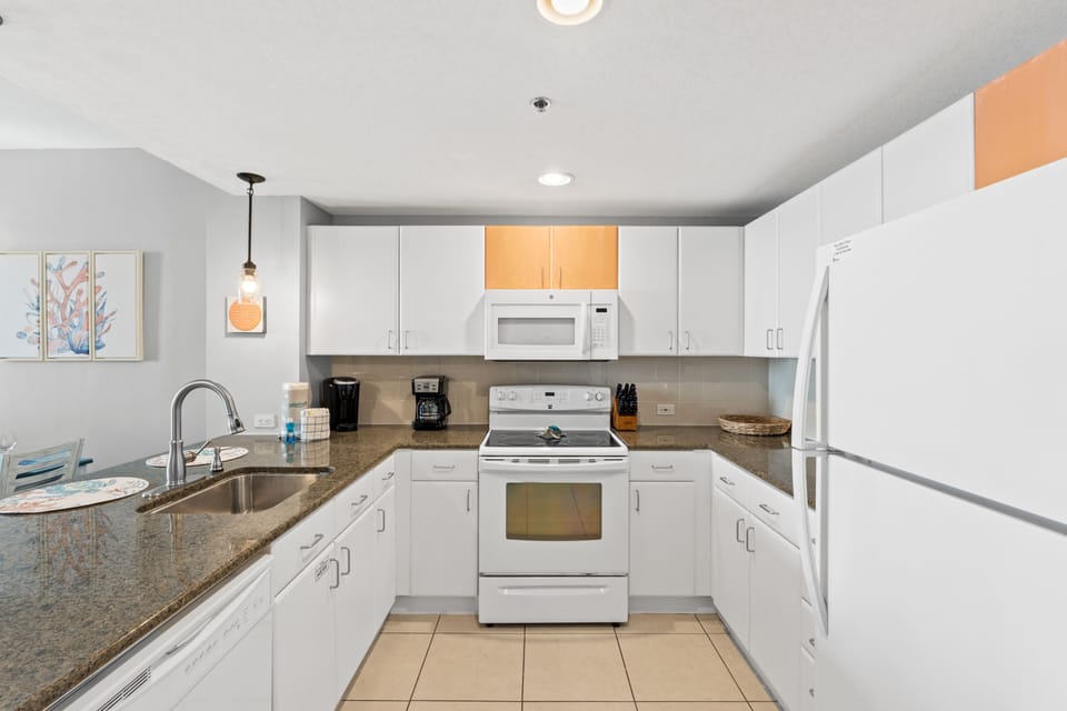 Fully Stocked Kitchen with Bar Seating