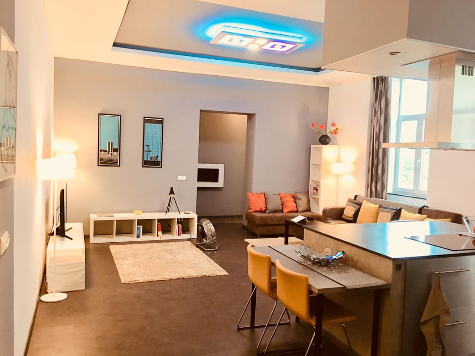 Large lounge and kitchen area. Sofa can be made up as a bed if required 