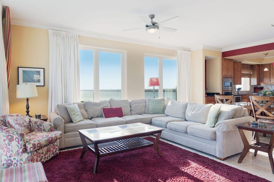 Living Area - Make memories to last a lifetime in this spacious unit. The open living area will be the focal point of all the quality time you can spend together. Featuring a comfortable, sectional sofa with a sleeper included, you can relax and enjoy each memory in the making.