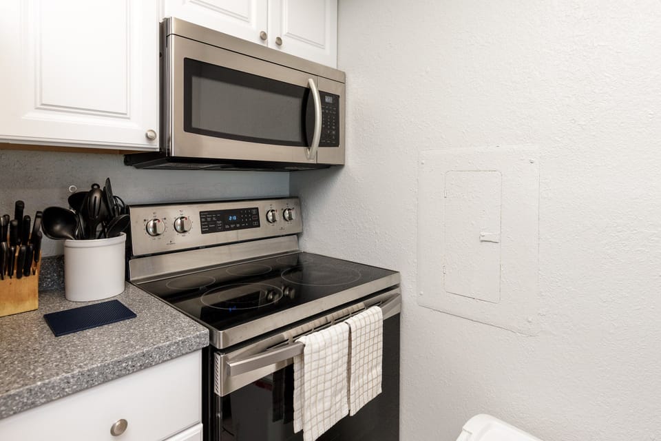 Your fully equipped kitchen features stainless steel appliances and everything you need to prepare delicious meals during your stay.
