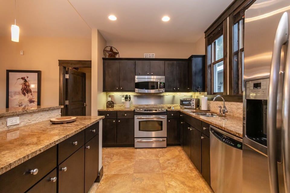 Fully equipped kitchen with stainless appliances