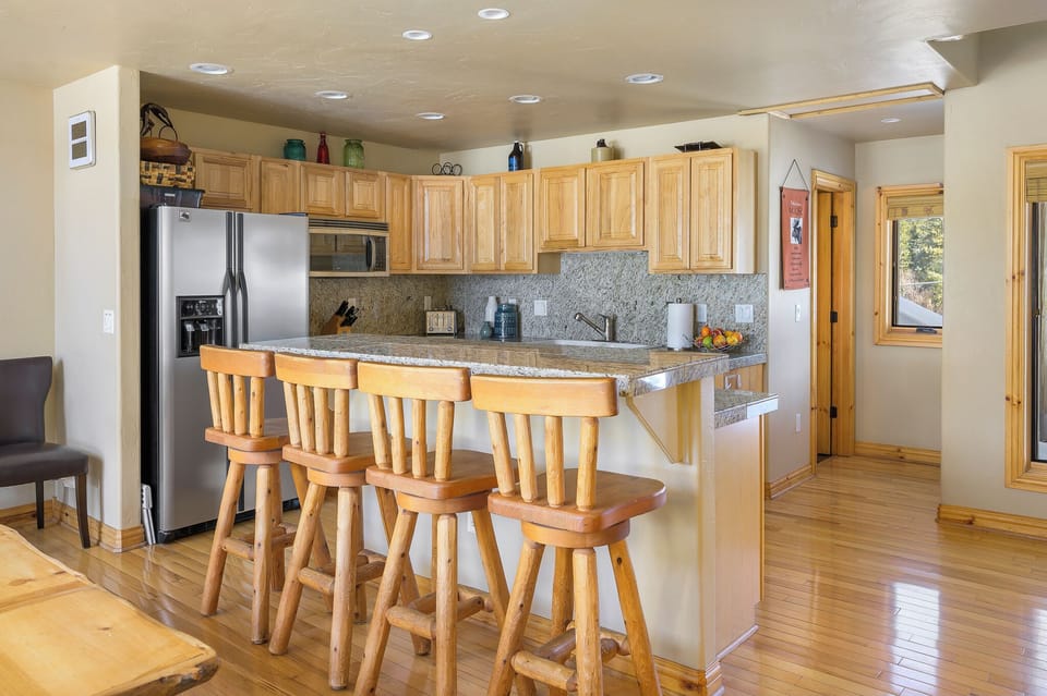 Four seats at the breakfast bar