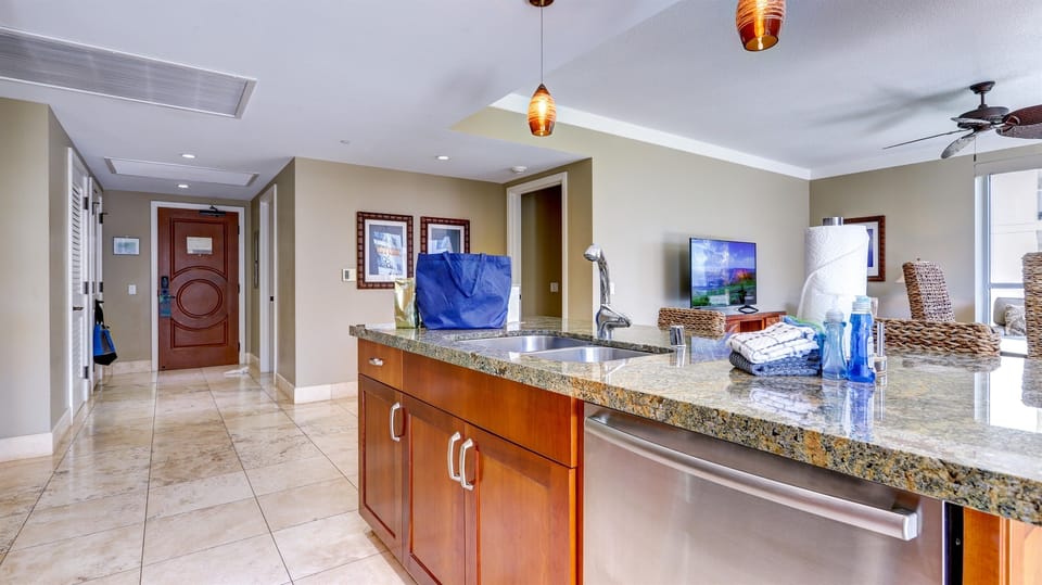 Granite countertops & upgraded flooring create a modern feel 