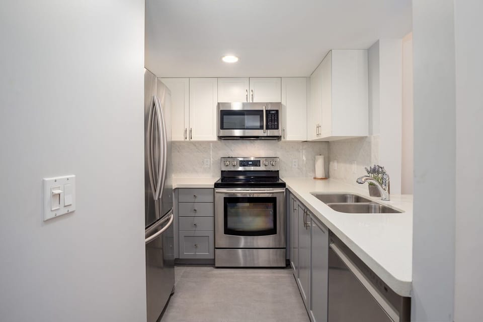 Sleek and functional kitchen space, ideal for preparing meals or snacks on the go.