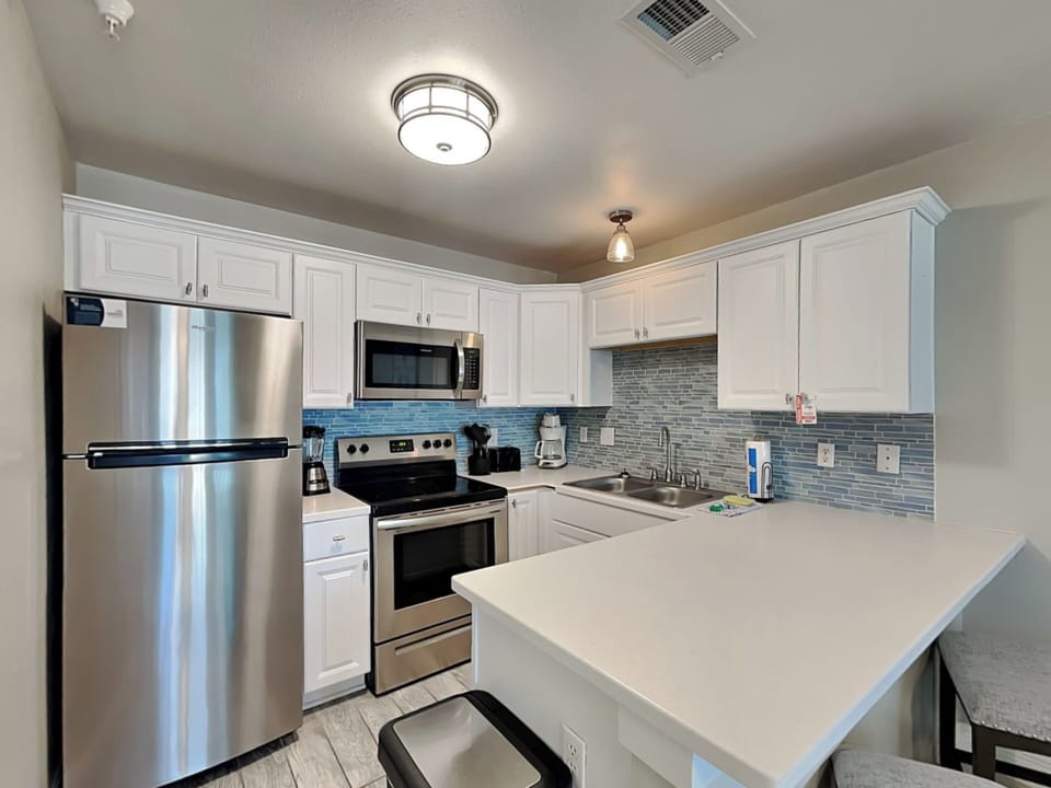 Fully Equipped Kitchen with Stainless Steel Appliances
