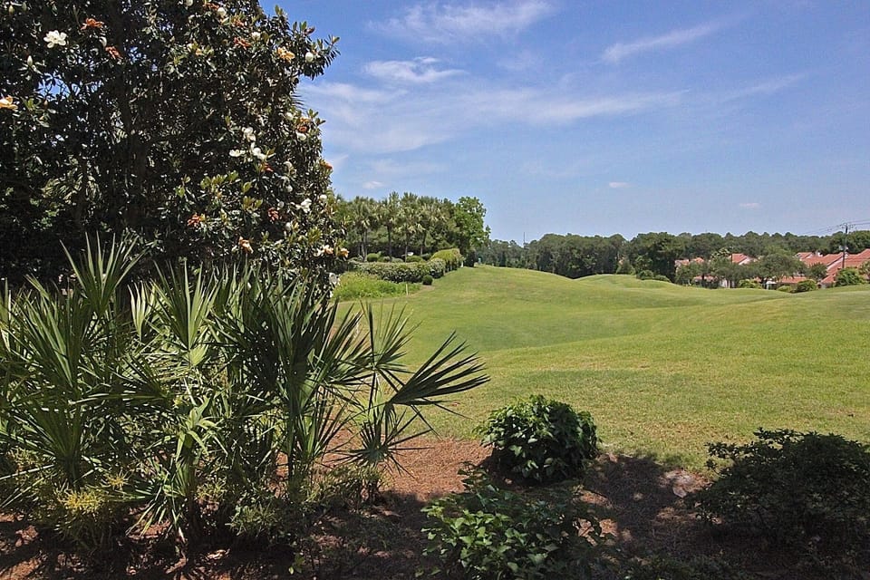 Porch view of one of 4 golf courses on the resort.