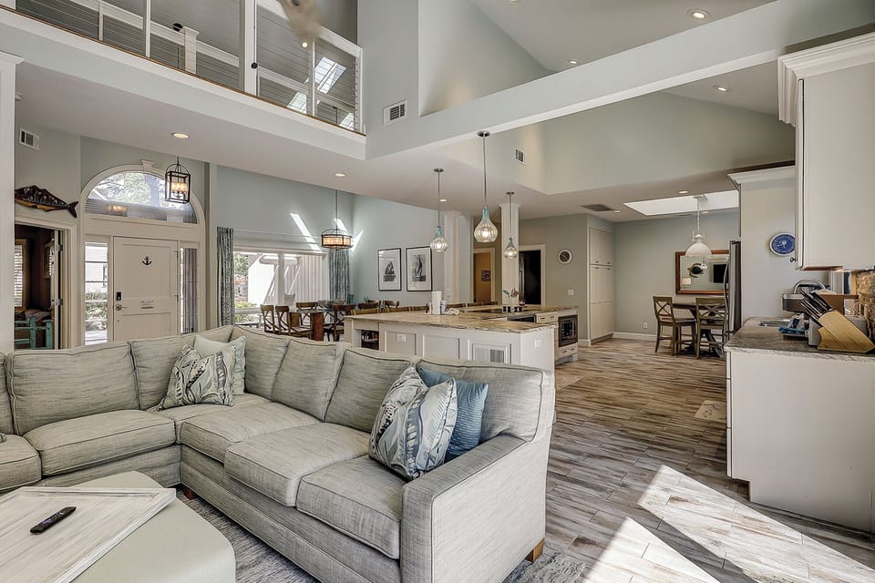 Open Concetpt View of Sitting Area, Kitchen and Dining Areas
