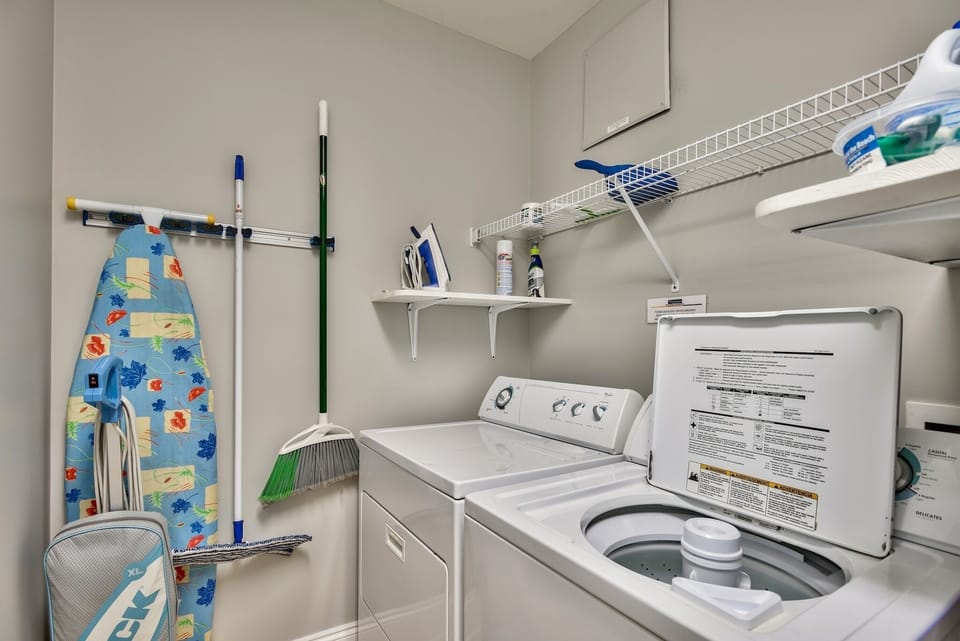 Laundry Room - Laundry room stocked with a starter pack of laundry detergent. NEW washer dryer in late 2019.