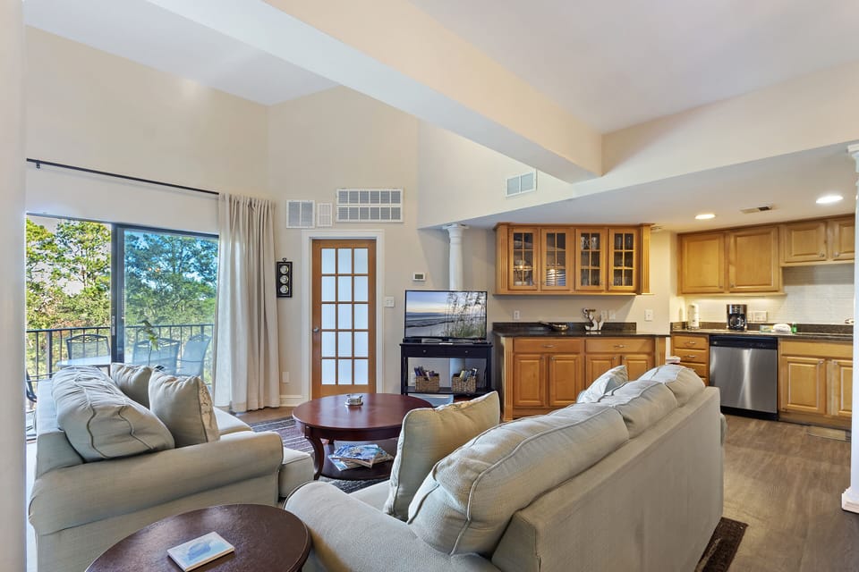 Living Area - Sleeper Sofa, TV, Balcony Access