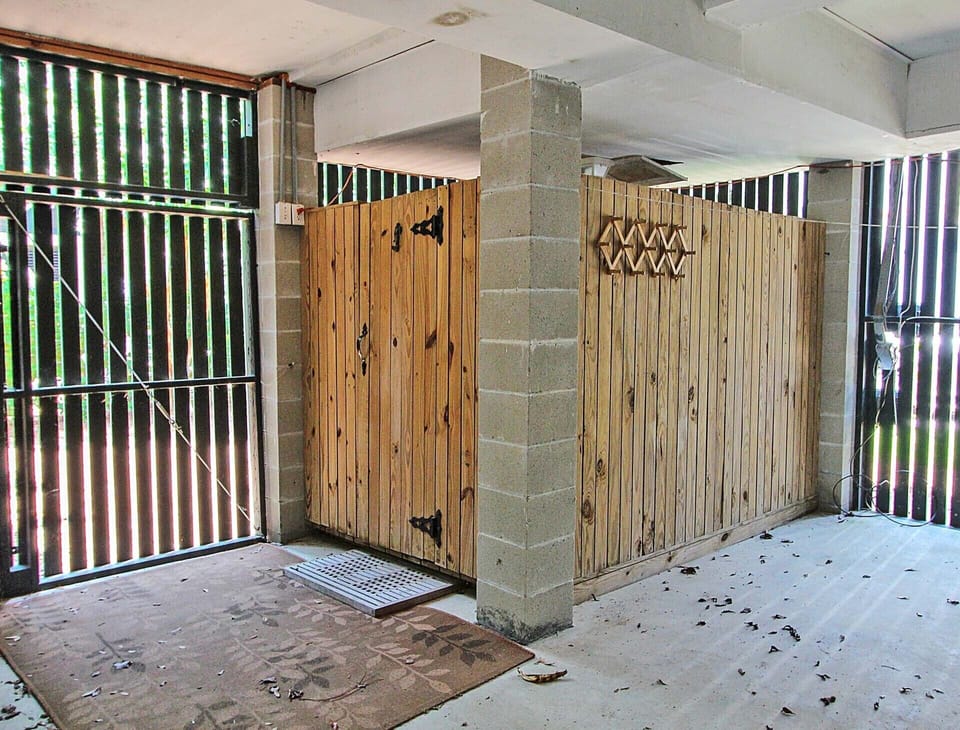 back of garage outdoor shower