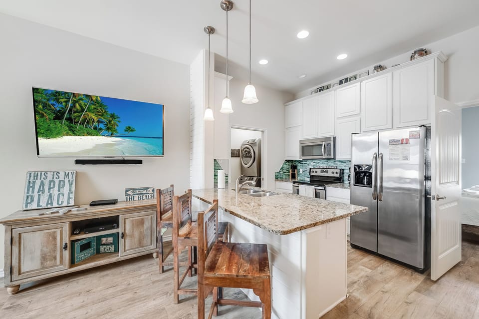 Your fully equipped kitchen and dining area blend comfort and style, perfect for preparing meals and enjoying quality time together.