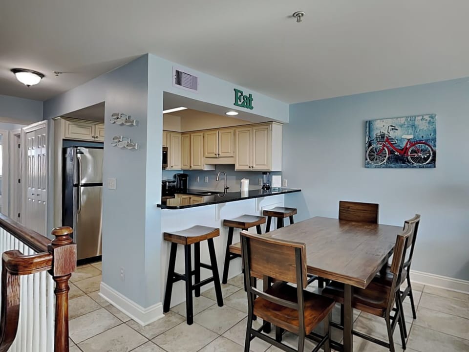 Dining Area and Kitchen with Bar Seating for Three - Second Floor
