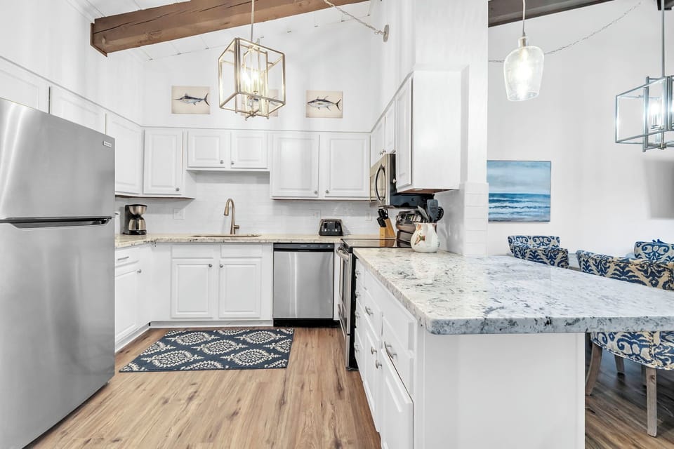 The Kitchen Boasts Modern Appliances