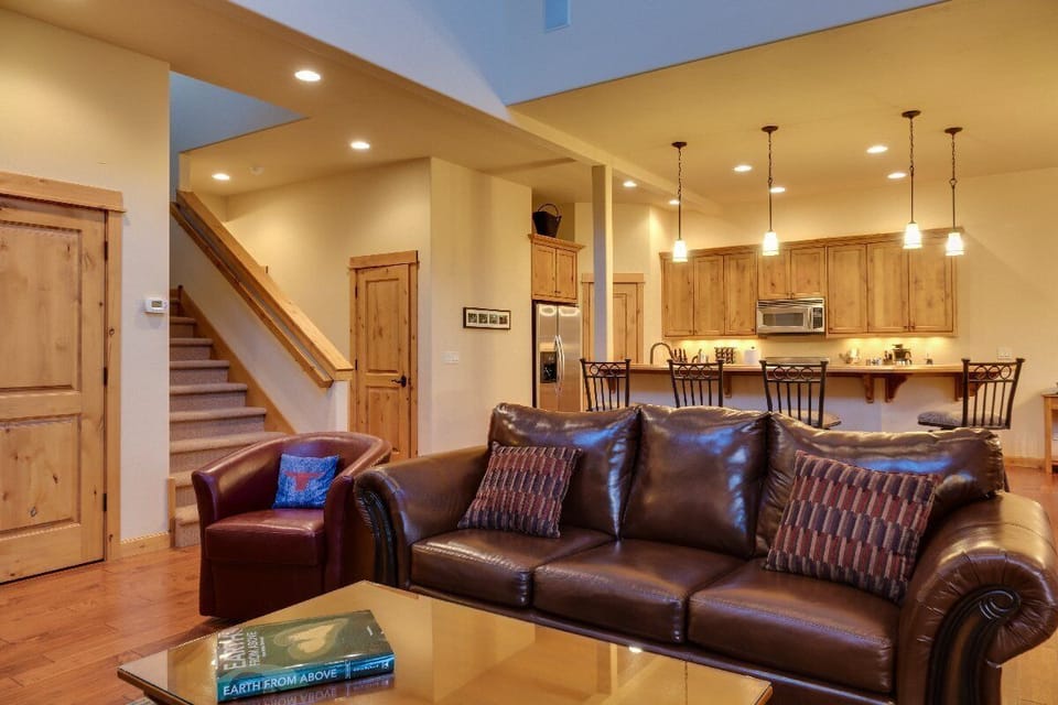 There is a gas-fired stone fireplace, large television, a selection of DVD’s, as well as cable service.