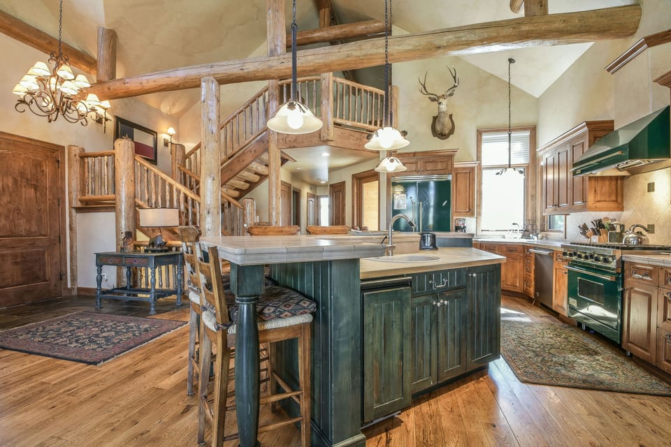 Vaulted ceilings and beams make for a beautiful living room