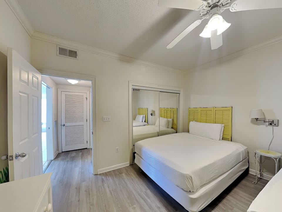 Third Bedroom - TV and Adjacent Full Bathroom in Hallway