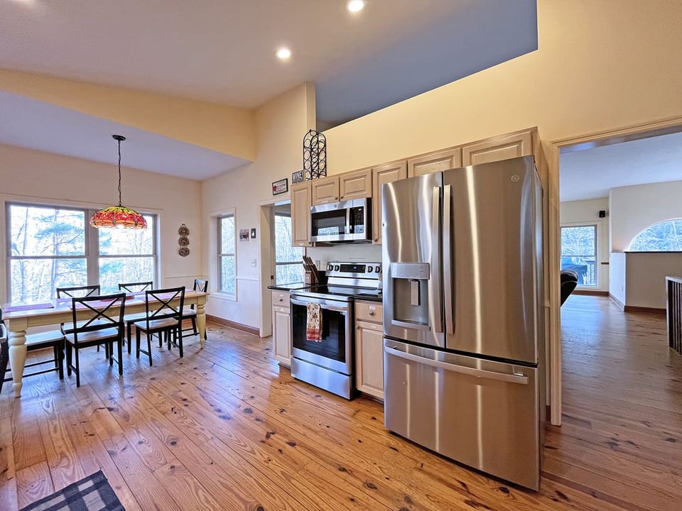 New Stainless Steel appliances.  Dining table seats 6 comfortably, plus 2 addtional chairs (8 is a cozier fit)