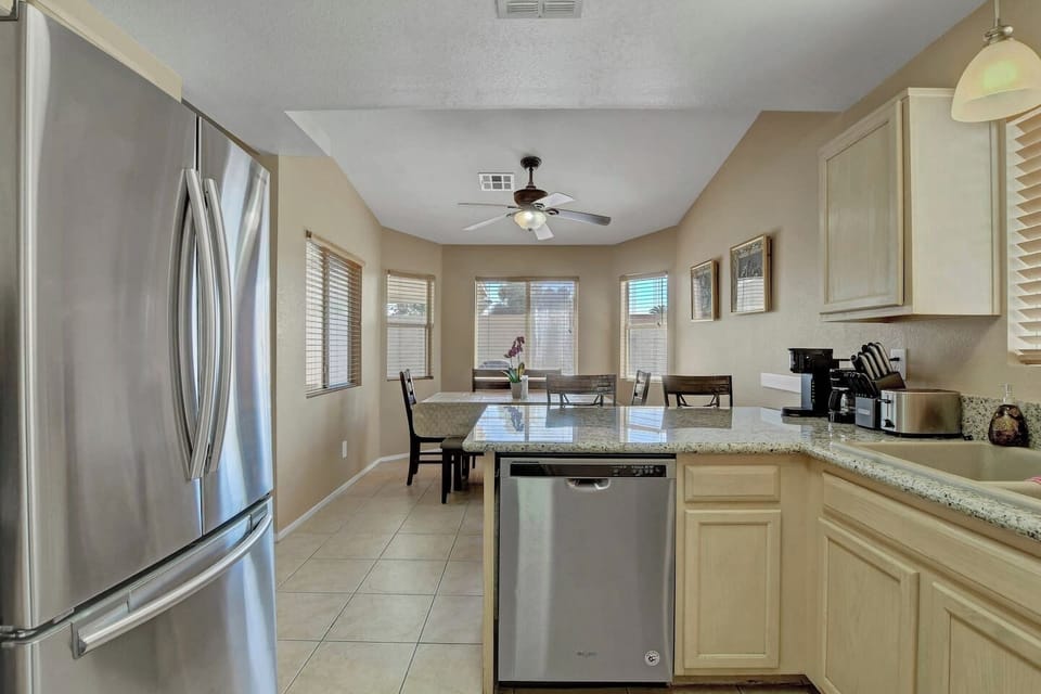 Full kitchen with modern appliances ideal for extended stays, remote workers, and corporate groups in Las Vegas NV.