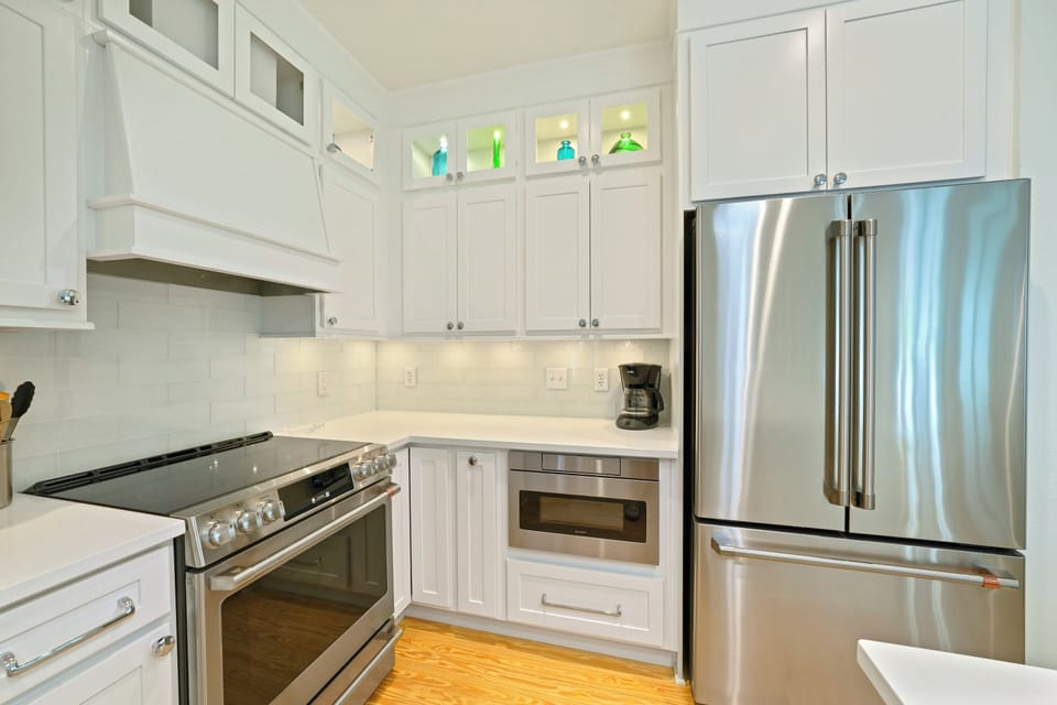 SIX BURNER ELECTRICAL STOVE TOP, SUB ZERO FRIDGE